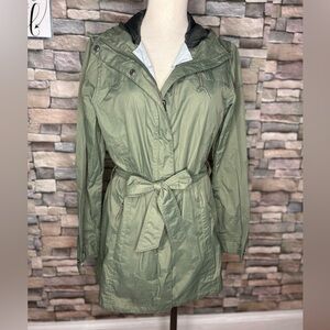 Columbia Hunter green nylon rain jacket fitted around waist with belt